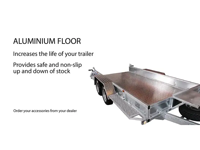 Integrated load securing rail with sliding lashing brackets